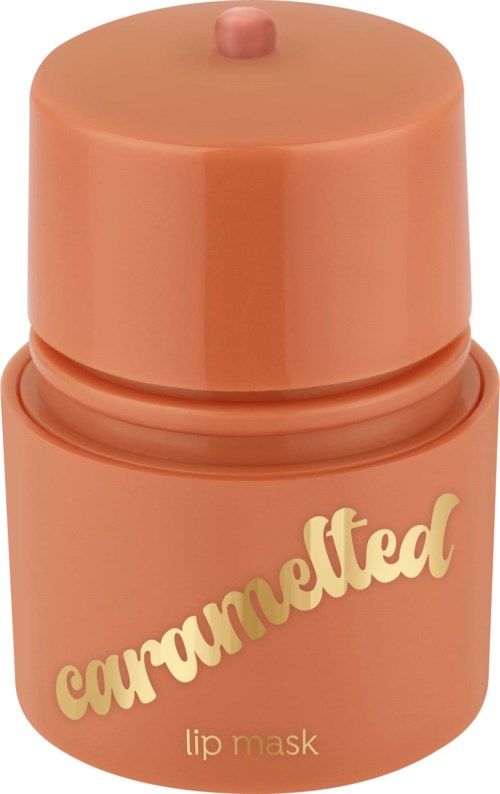 A peach-colored container of caramel-flavored lip mask with a rounded lid and creamy font text.