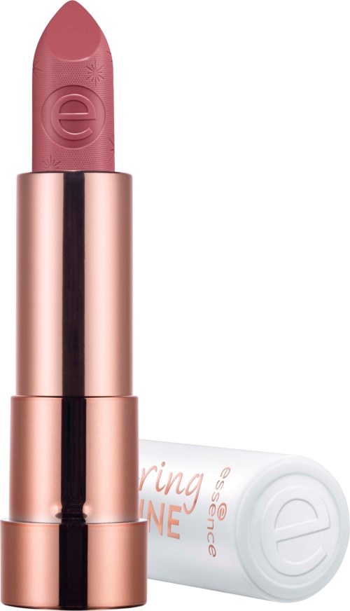 A pink lipstick in a rose gold tube with a white cap. The cap has logo and text on it.