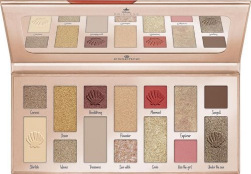 Eyeshadow palette with various gold, pink, beige, and brown shades, some with shimmer and matte finishes.