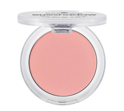 Ein runder rosa Rouge in einer transparenten Plastikschale mit weißem Deckel. Der Deckel ist offen und zeigt den Rouge.