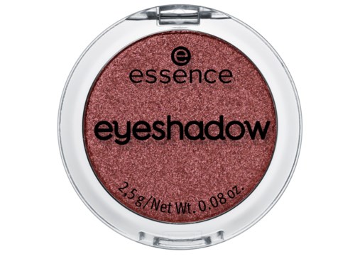 Ein runder Lidschattenbehälter mit rosa Puder, transparenter Deckel und Text mit Marke und Produktdetails.