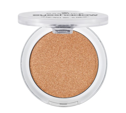 Ein Kompakt mit schimmerndem, goldenem Make-up und durchsichtigem Deckel. Der Markenname ist oben.