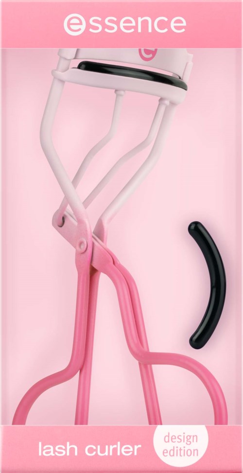 A pink eyelash curler with a black rubber pad, branded 'essence lash curler design edition'.