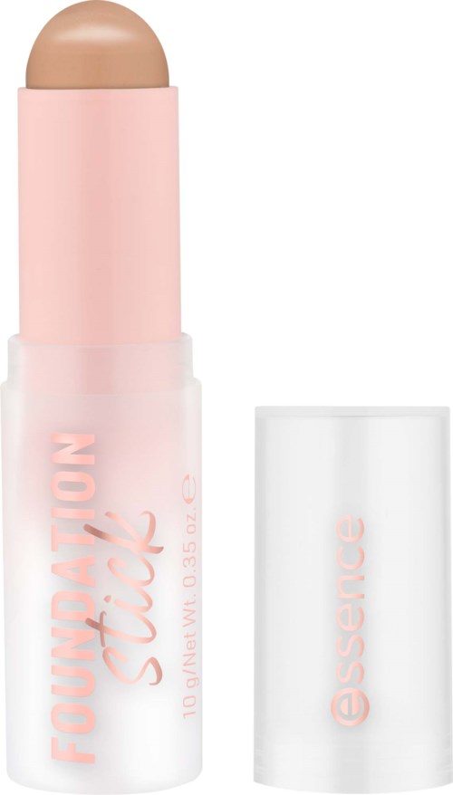 A beige foundation stick in a pink and white container with a cap labeled Essence.