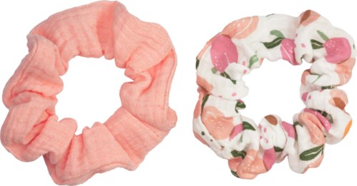 Två tyg-hårslingor, en enfärgad rosa och en med blommönster i rosa, grönt och vitt.