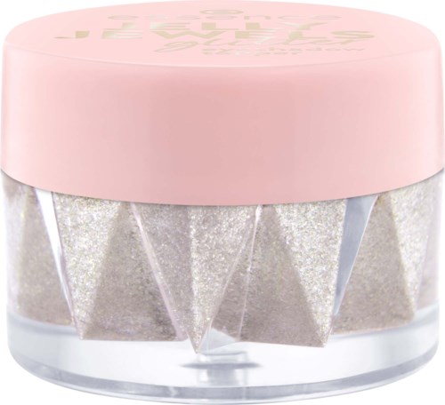 A small container with pink lid, containing shiny silver cosmetic wedges inside.