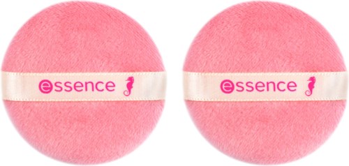 Two pink fuzzy round makeup sponges with white straps labeled 'essence' and a pink 'e'.