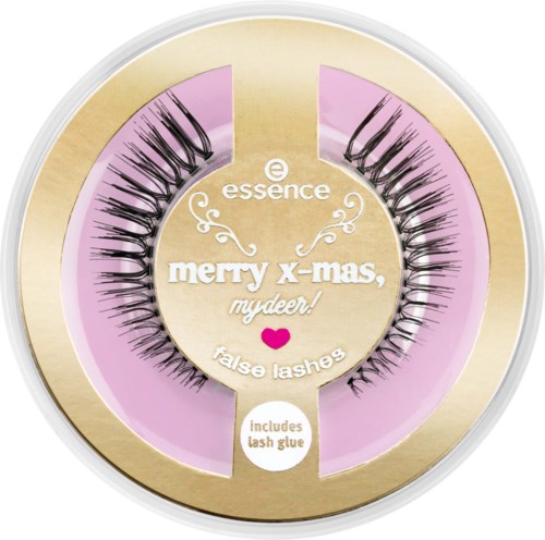 Falska ögonfransar i ett runt paket med rosa och guld, märkt för jul, inklusive lim.