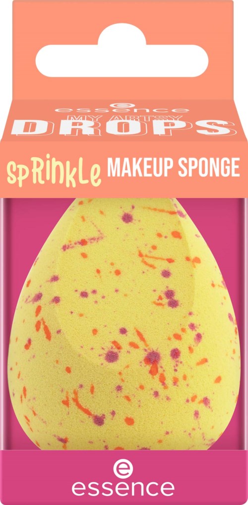 A yellow makeup sponge with orange and pink paint splatters inside a pink and orange package.
