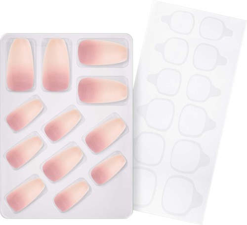 Silicone false nails in a tray, some are shaped like natural nails.