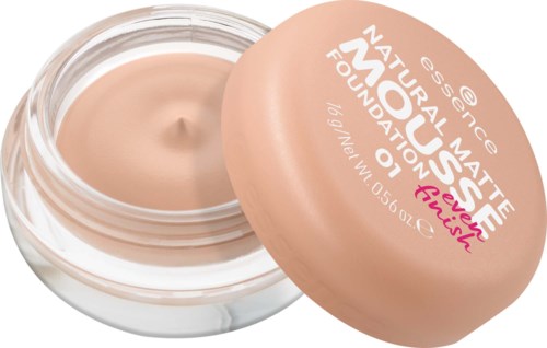 A jar of beige foundation with pink lid, labeled 'Natural Matte Foundation' by Essence for a smooth finish.