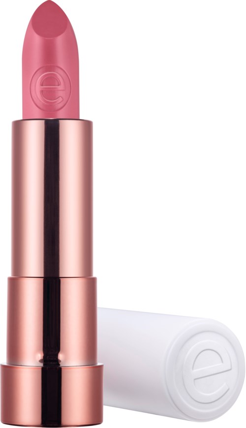 Ett rosa läppstift i ett glänsande guld- och rosa rör med ett vitt lock bredvid.