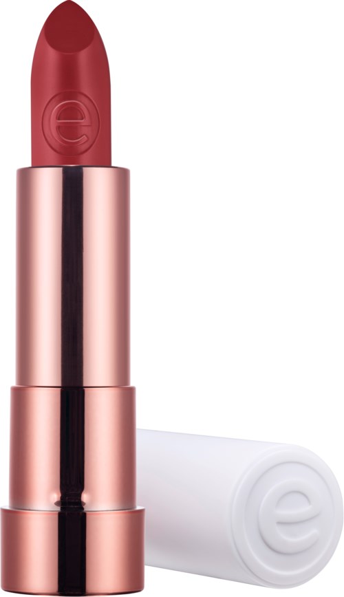 En läppstift i roséguldskal med en vit lock bredvid, visar rödlämplig läppstift.