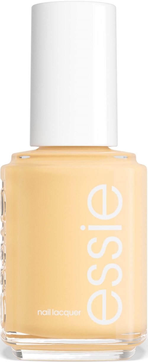En flaska nagellack i beige färg med vit lock och ordet 'essie' på.