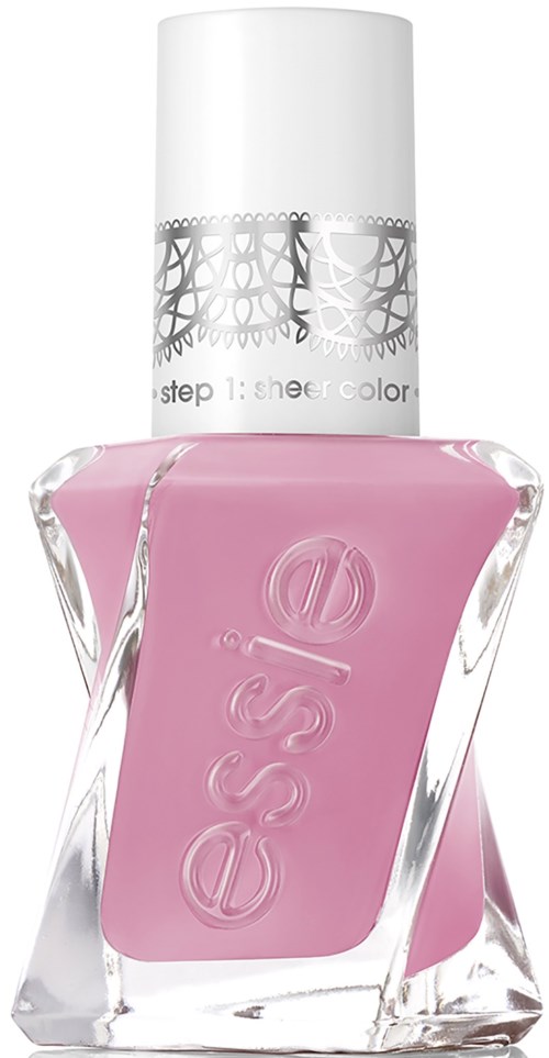 Pink nail polish in a clear glass bottle with a white cap.