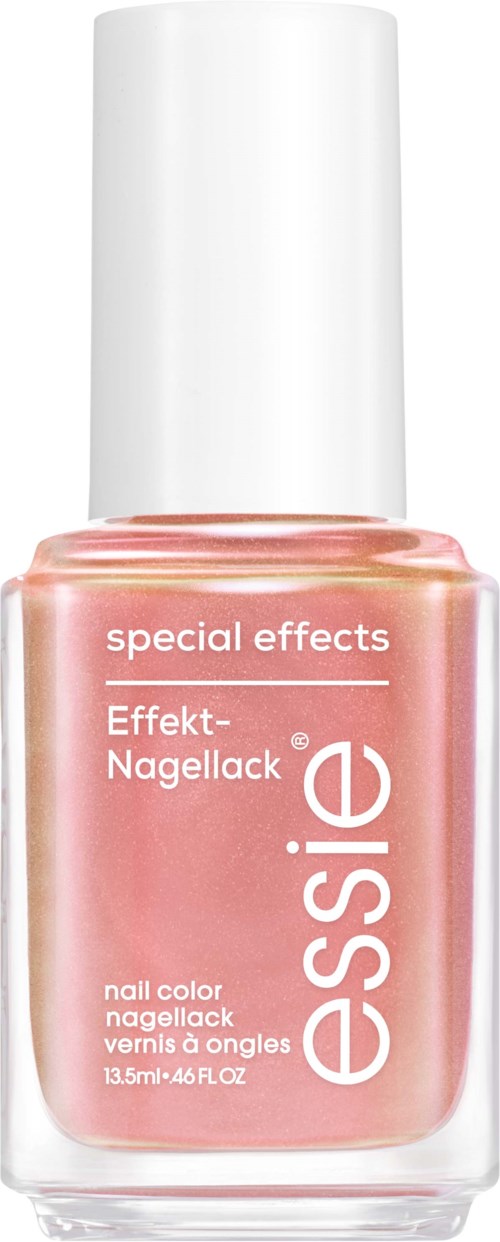 A bottle of Essie special effects nail polish in a peachy pink color.