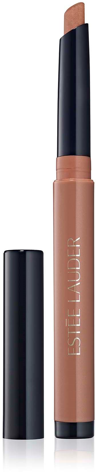 Een beige lippenstift met een zwart deksel, met deksel verwijderd om de lipstick te laten zien. Leslie Muder merk.