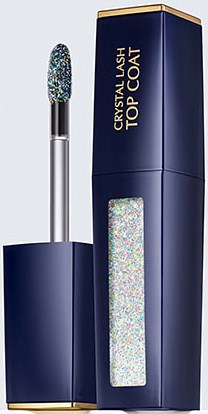 En nagellackflaska med glittrig toppbeläggning och en matchande blå låda.