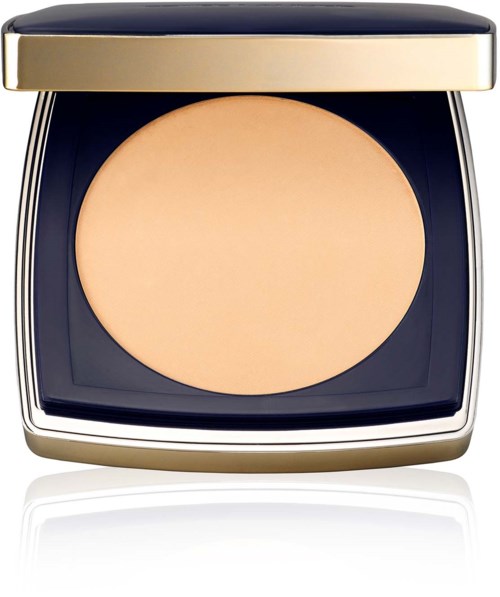 A compact powder case with a beige powder inside and a shiny, round, gold-colored lid.