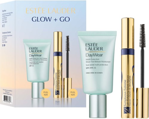 Zestaw Estée Lauder Glow + Go zawiera krem nawilżający i tusz do rzęs w stylowej złotej i niebieskiej opakowaniu.