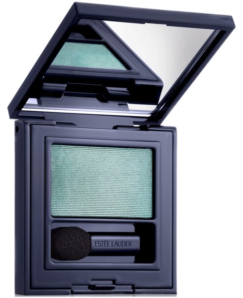 A teal eyeshadow in a compact with a mirror and a sponge applicator inside.