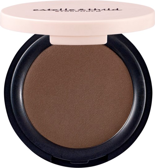 En liten kompakt med brunt pressat puder inuti och ett vitt lock. Det verkar vara ett sminkprodukt.