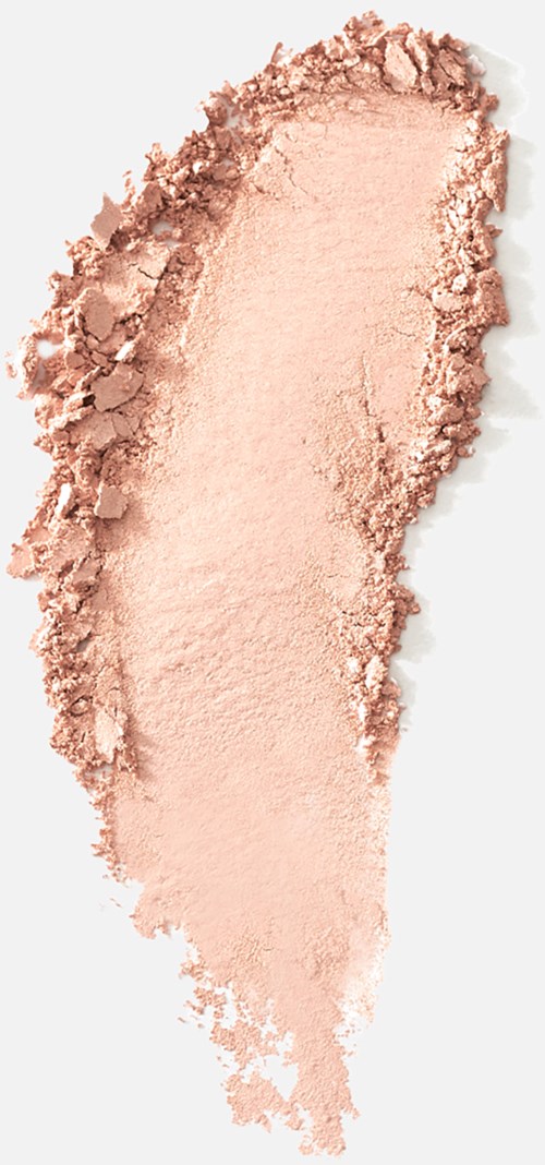 En provbit av ljusrosa pulver, möjligen makeup, med en grov, ojämn kant och mjuk textur.