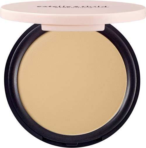 A compact powder case with a beige shade and a white lid. The lid has text written on it.