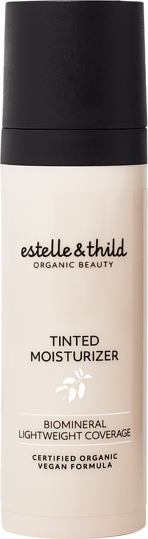 En vit flaska med svart lock, kallad Estelle & Thild tinted moisturizer, ekologisk, lätt, vegansk.
