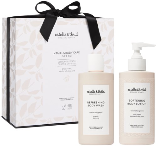 Ett presentset med kroppstvätt och lotion i vita flaskor, en box med svart band och enkel blommig design.