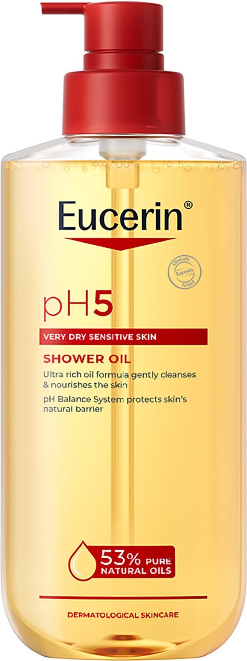 Eucerin shower oil bottle with red pump, yellow liquid inside, and label showing pH 5 for very dry sensitive skin.