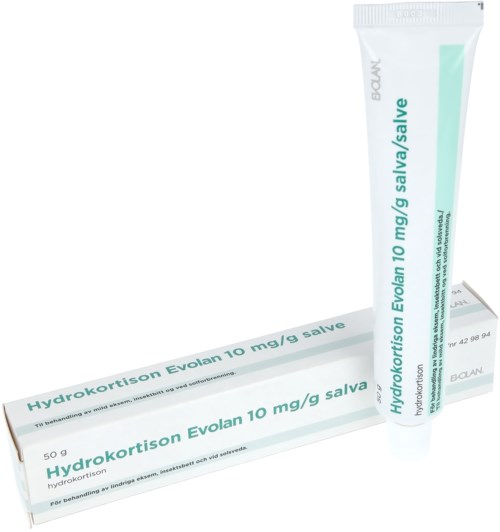 En tub och förpackning av Hydrokortison Evalon 10 mg/g salva, används för hudbehandling. Förpackningen är mest vit med ljusblå text.