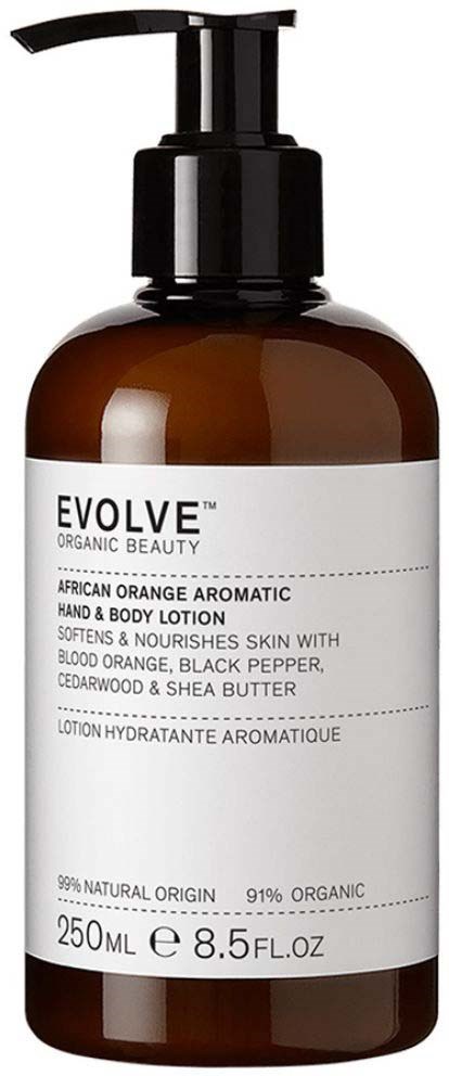 En brun flaske med svart pumpe, merket 'Evolve Organic Beauty African Orange Aromatic Hand & Body Lotion,' størrelse 250ml.