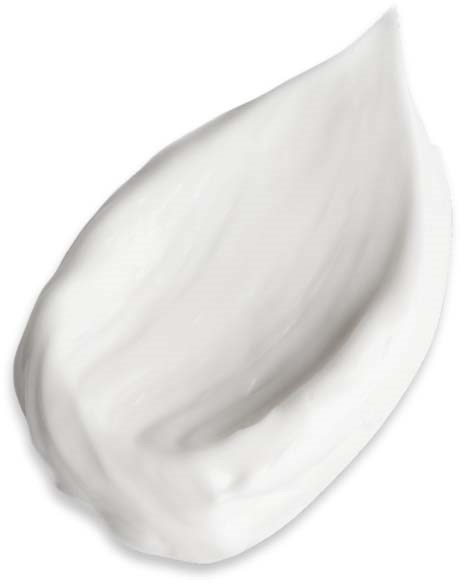 En klatt hvit krem eller lotion på en hvit overflate.