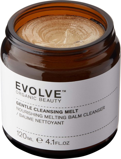 A brown jar labeled 'EVOLVE Organic Beauty' with a gentle cleansing balm inside.
