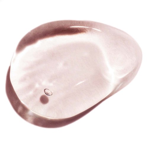 A smooth, oval-shaped, pinkish-white stone with a small, round, dark spot inside.