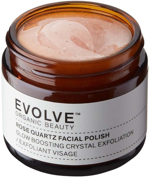 A small jar of rose quartz facial polish with glitter, labeled 'EVOLVE' for glowing skin and exfoliation.