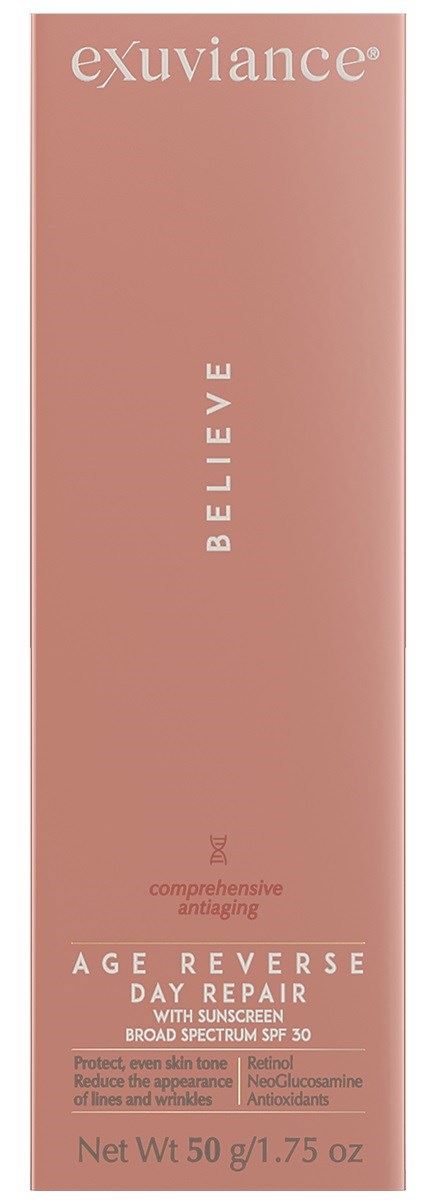 En rosa hudvårdsprodukter box med vitt och liten text, kallad 'exuviance,' 'BELIEVE,' och 'AGE REVERSE DAY REPAIR.'
