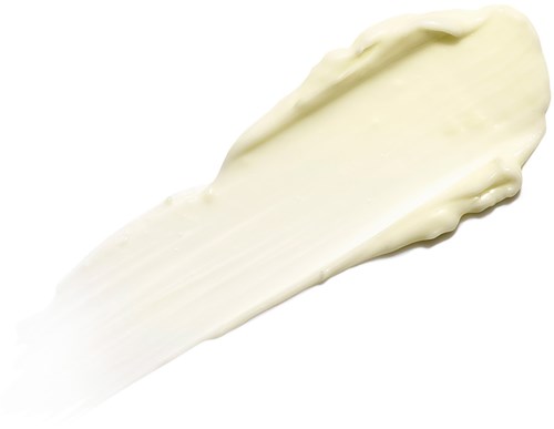 Et lag av kremete, hvit substans, glatt og tykk, sannsynligvis lotion eller krem.