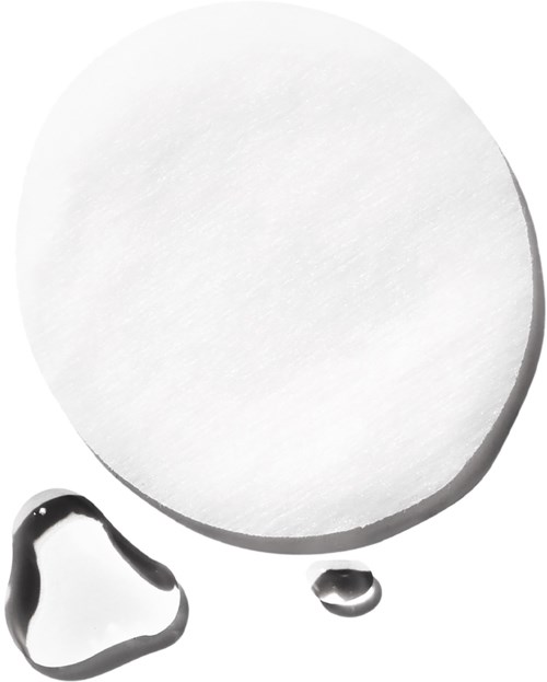 A large round white pill with a shadow, accompanied by a small heart-shaped and circular object below it.