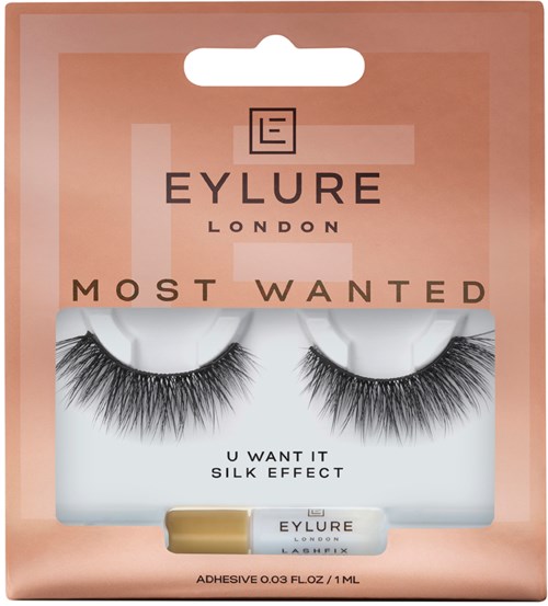 False eyelashes in pink packaging labeled Eylure London, with a small tube of adhesive included.