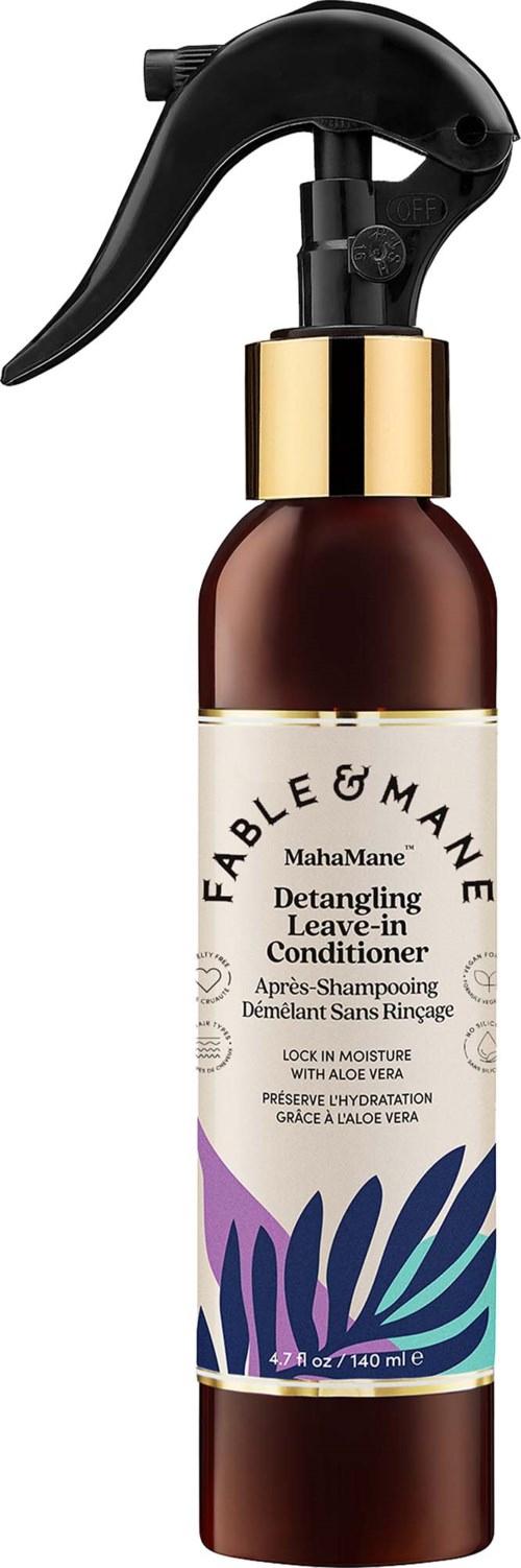 Detangling leave-in conditioner in a brown spray bottle with a black trigger and gold collar, featuring a colorful leaf design.