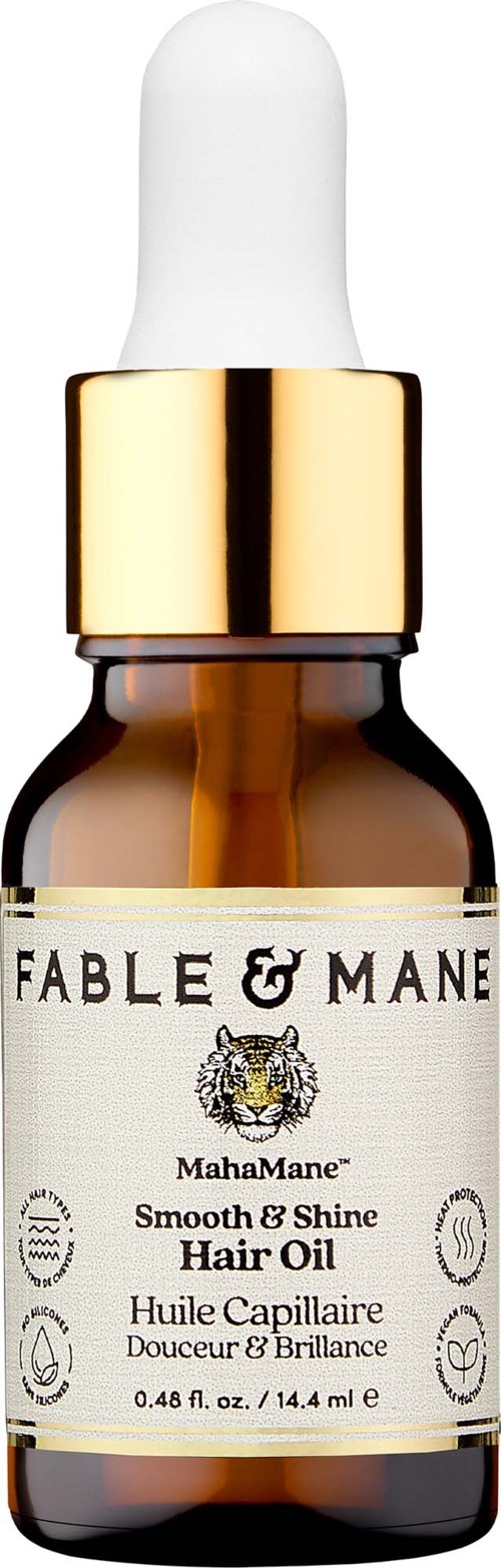 Amber glass dropper bottle of Fable & Mane Smooth & Shine Hair Oil with a white cap and gold collar.