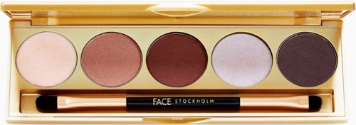 Kultainen meikkipalette, jossa on viisi silmienrajaustapaa ja kahden päädyn siveltim.