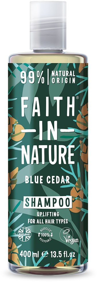 En sjampo-flaske med etiketten 'Faith in Nature' med blå og grønn løvdesign, som sier at den er for alle hårtyper og er vegansk.