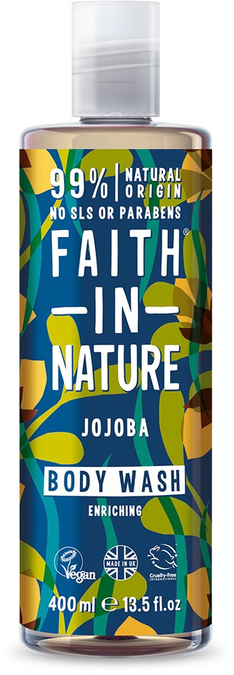 En flaska Faith in Nature jojobadusch med en färgglad etikett som främjar naturliga ingredienser och är vegansk.