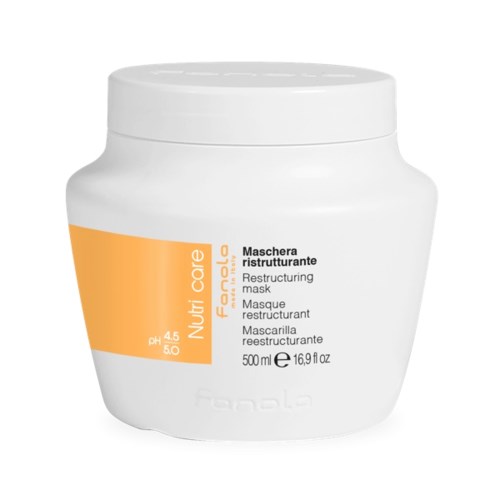 Ein weißer Behälter mit einem orangefarbenen Etikett, das Text über Haarrekonstruktion und Pflege enthält. 500 ml.
