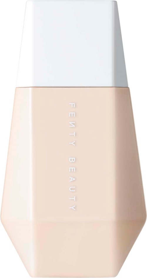 Beżowa butelka z białym nakładką, z napisem 'FRESH BEAUTY', stojąca na białym tle.