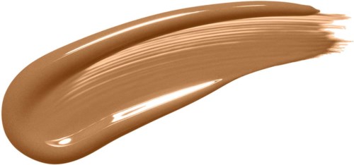 A swirl of beige foundation makeup with a shiny, creamy texture.