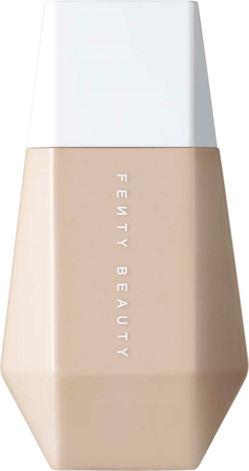 A beige bottle with a white cap, labeled 'FENTY BEAUTY'. It has a geometric shape and simple design.